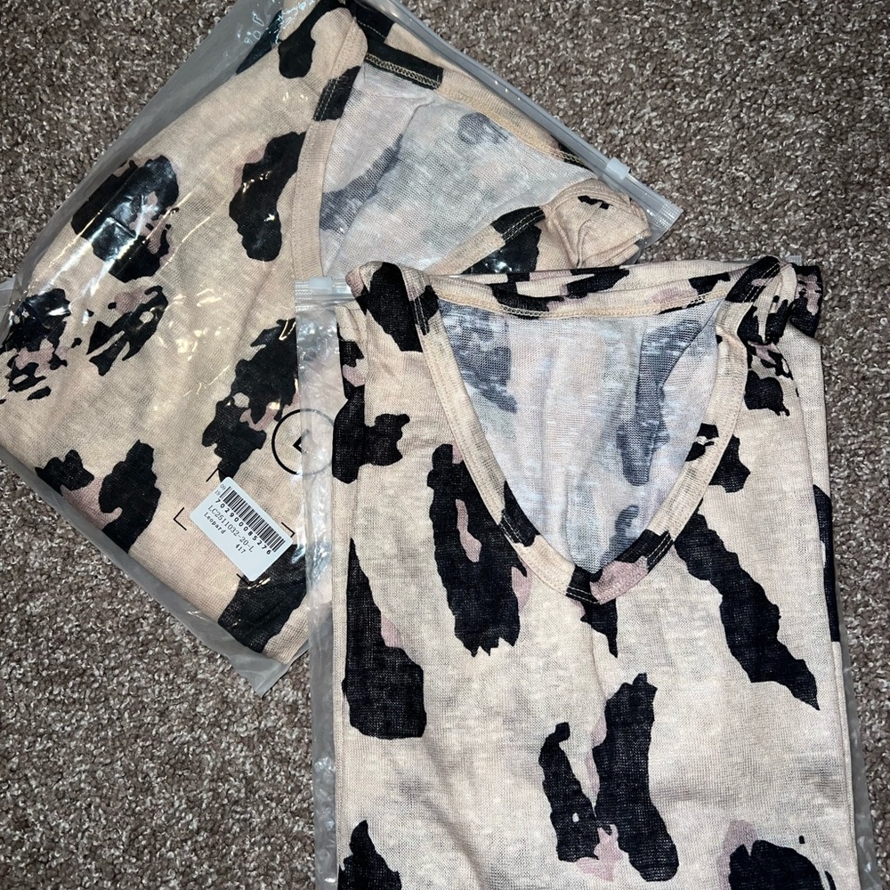 New in packaging. Women’s top. 2 available sizes M&L